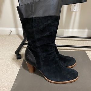 UGG suede boots with leather trim.